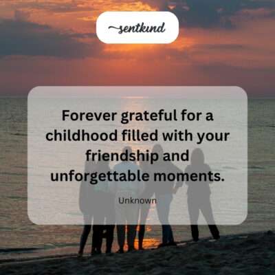 Two young children, silhouetted against a warm sunset, hold hands as they walk down a path, symbolizing enduring childhood friendship.