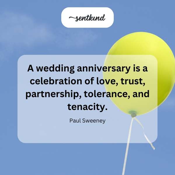 A couple embraces tenderly amidst decorations symbolizing love and commitment.