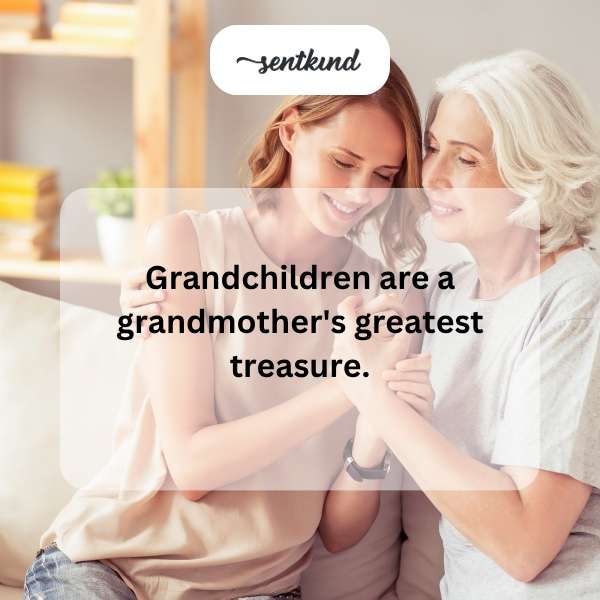 A smiling grandmother is surrounded by her three laughing grandchildren.