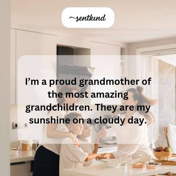 A joyful grandmother smiling while hugging her two young grandchildren outdoors on a sunny day.