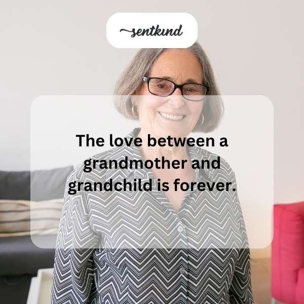 A smiling grandmother embraces her young grandchild lovingly, their faces close together.