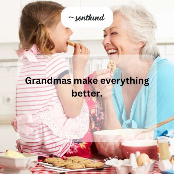 A smiling grandmother and child are baking cookies together in a warm, sunlit kitchen, symbolizing comfort and joy.