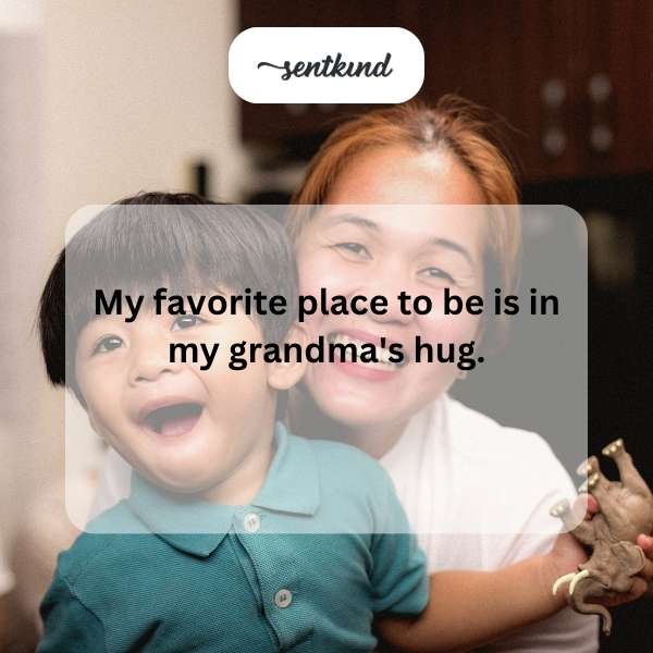 A smiling young person is embraced tightly by their grandmother, who is also smiling warmly.