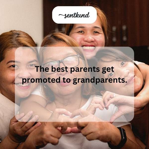 An older couple happily holds their grandchild, symbolizing their new role as grandparents.