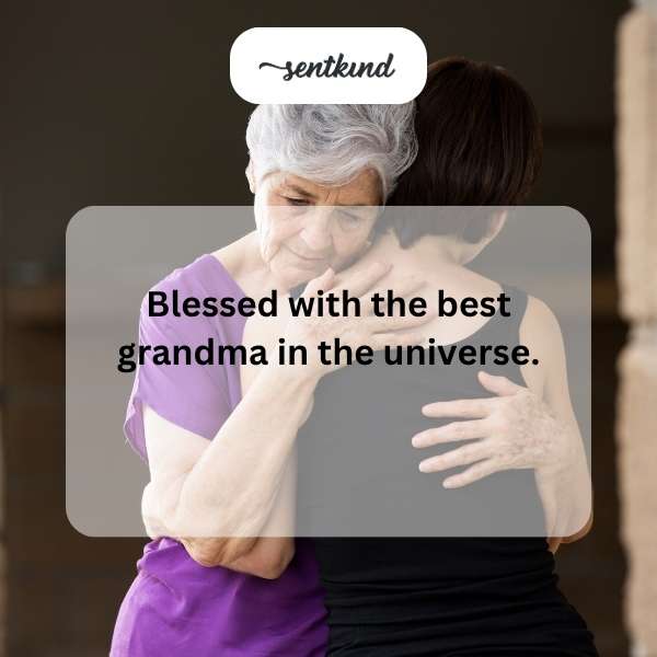 A smiling grandmother is hugging her young grandchild affectionately.