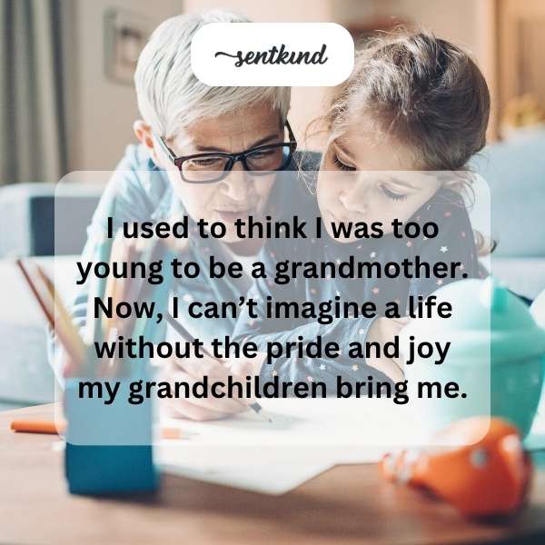 A happy grandmother smiles while playing with her young grandchildren outdoors.