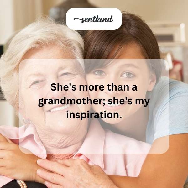 A young woman smiles while sitting beside her elderly grandmother on a porch swing.