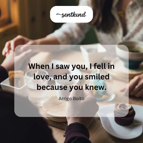 A couple gazes at each other with evident affection and knowing smiles.