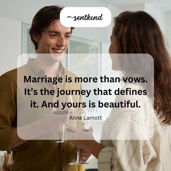 A happy couple walks hand-in-hand through a sunlit forest.