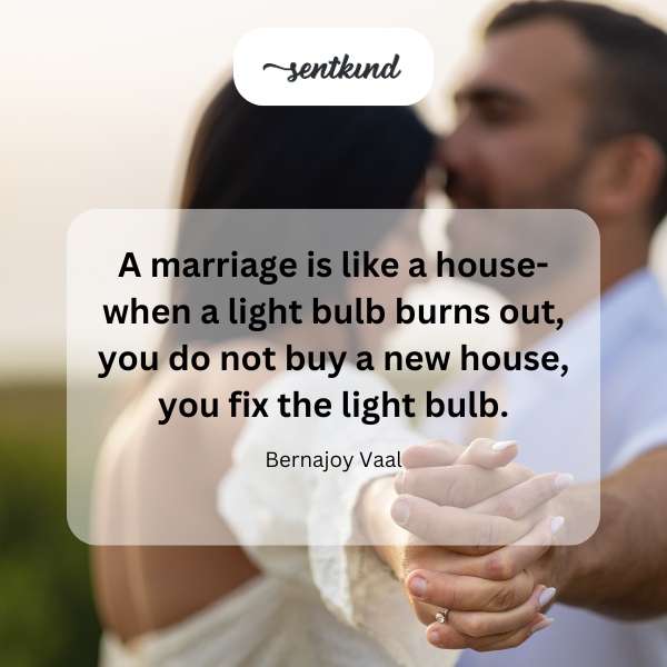 A house interior shows a person replacing a light bulb in a lamp.