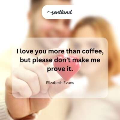 A person affectionately holds a steaming coffee mug close to their face.