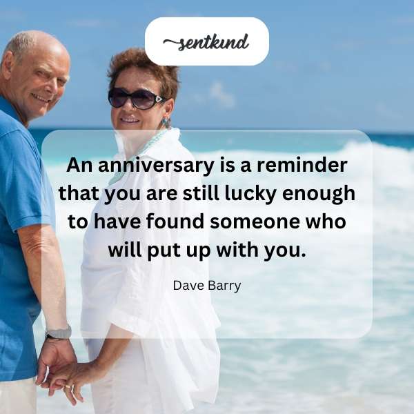 A couple laughing together while looking at a humorous anniversary card.