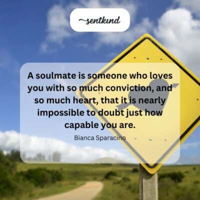 A person looks forward confidently, with a supportive hand resting gently on their shoulder, symbolizing a soulmate's empowering belief.