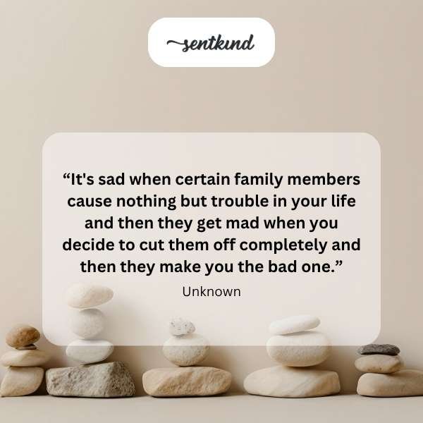 A diverse group of smiling friends are embracing each other closely in a warm, supportive huddle.