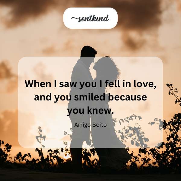 A couple gazes lovingly at each other, sharing a knowing smile.
