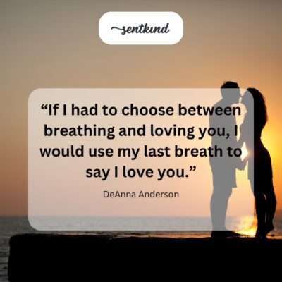 A couple embraces tightly on a cliff overlooking a dramatic sunset, symbolizing profound and enduring love.