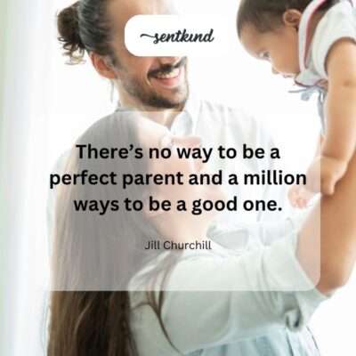 A parent and child covered in paint smile at each other, capturing a moment of joyful, imperfect parenting.