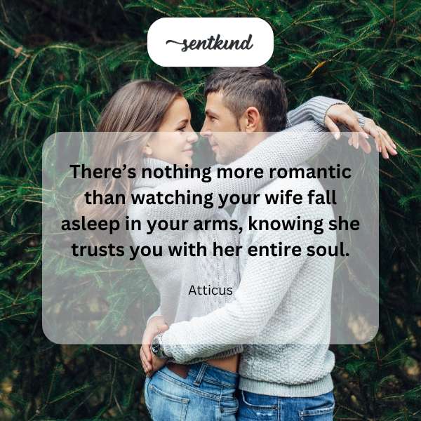 A woman sleeping peacefully in a man's arms.