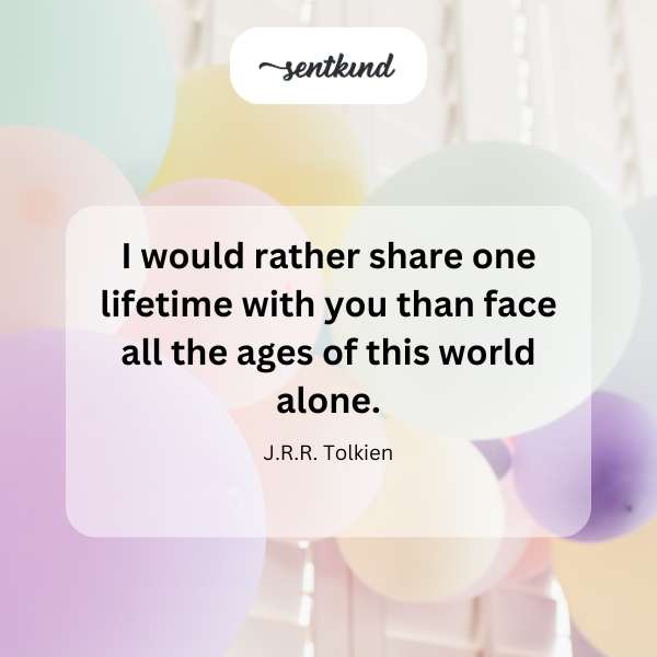 An open book displays the quote 'I would rather share one lifetime with you than face all the ages of this world alone.'