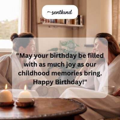 A photo shows two friends laughing while looking at old childhood pictures during a birthday celebration.
