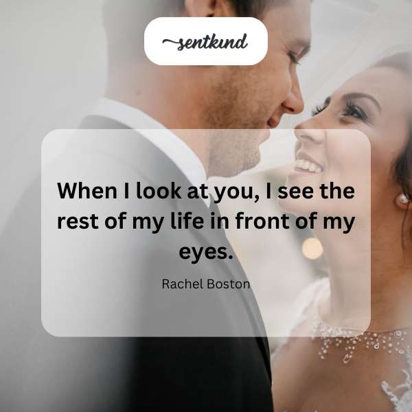 A loving couple gazes into each other's eyes, radiating happiness and connection.