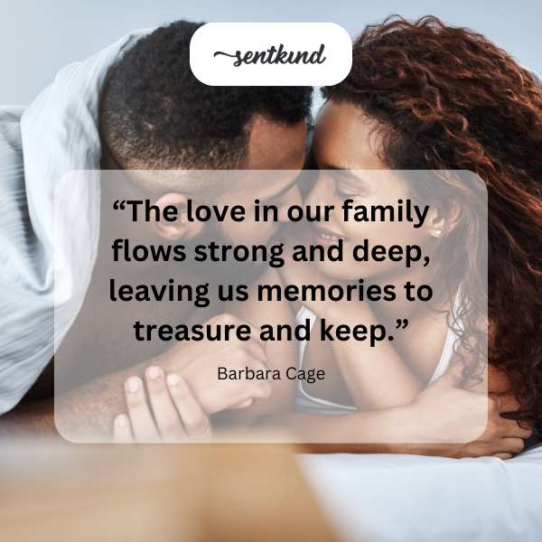 A family of four is embracing, with sunlight streaming through the window, showing love and warmth.