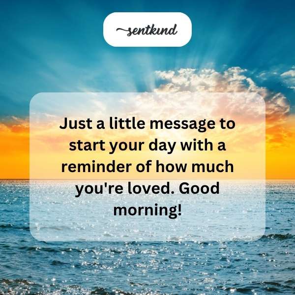 A soft gradient of warm pastel colors serves as a background for elegant white text conveying a morning message about being loved.