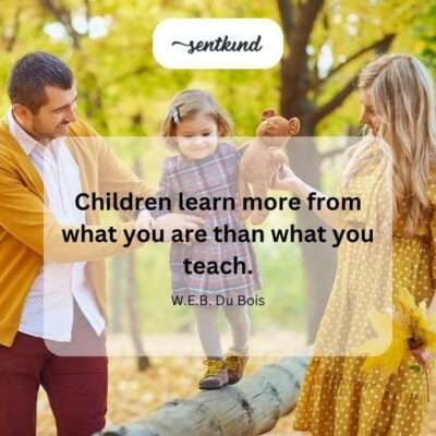 A child attentively observes an adult demonstrating a positive behavior, emphasizing learning through action.