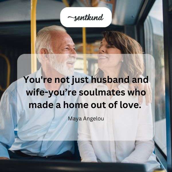 A loving couple embraces in their warmly lit home.