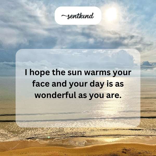 A person smiles while tilting their face towards bright sunlight.