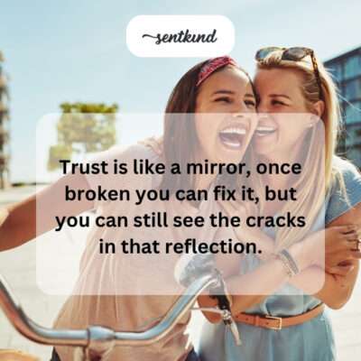 A close-up shows a mirror with many visible cracks across its surface, symbolizing broken trust.