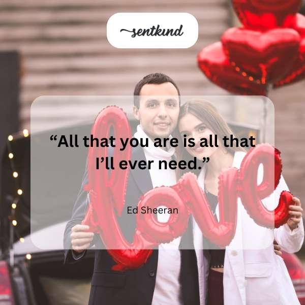 A couple embracing tenderly against a softly blurred background.