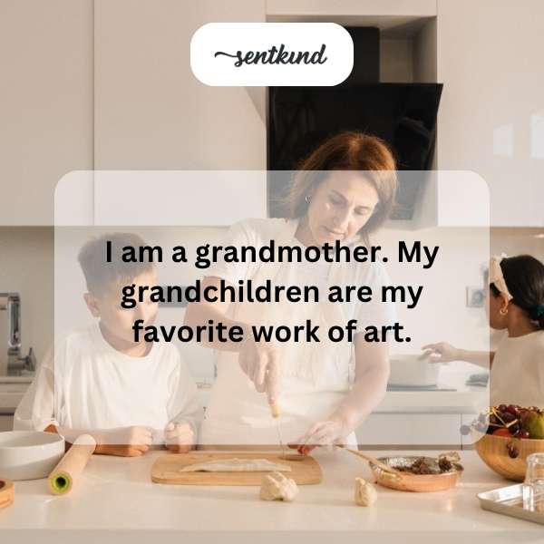 A smiling grandmother beams while proudly displaying a collection of colorful drawings and handmade art created by her grandchildren.