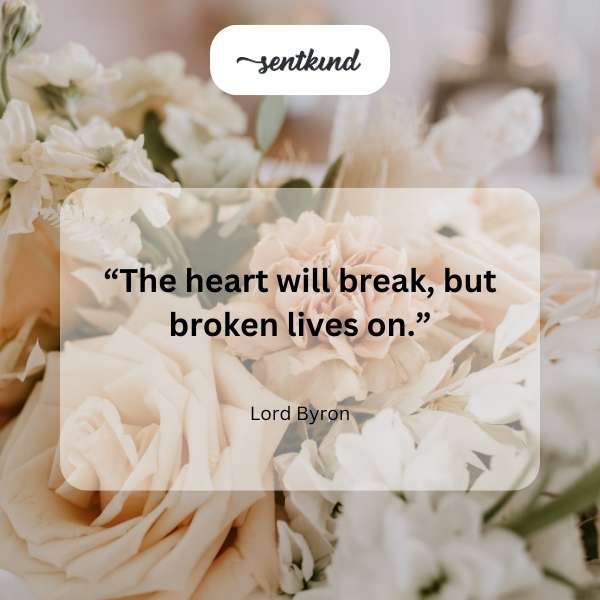 A shattered glass heart reflects a vibrant sunrise.