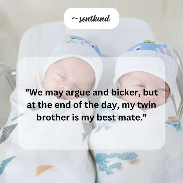 Two young men, presumably twins, are back-to-back smiling.
