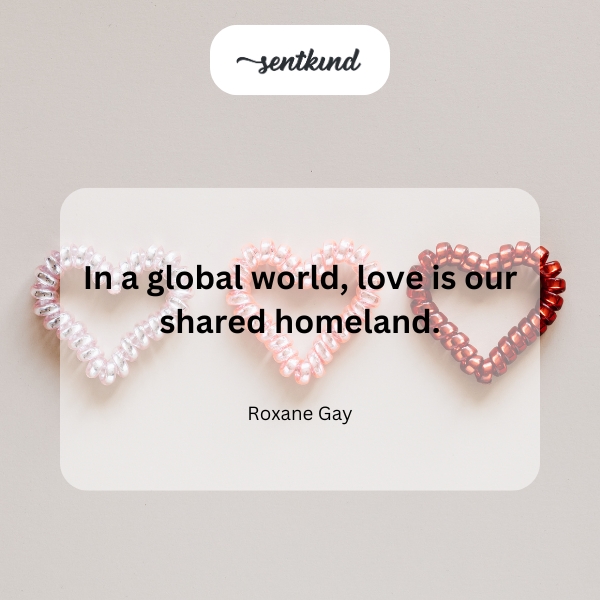 A diverse group of people stand together holding hands in a heart shape.