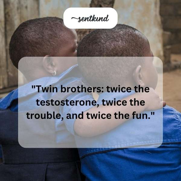 Identical twin brothers are smiling and playfully bumping shoulders.