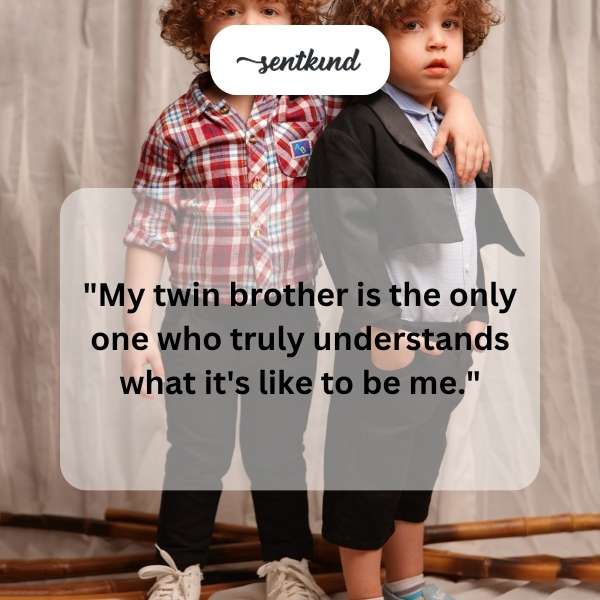 Identical twins mirroring each other's expressions and posture.