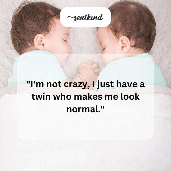 Two identical people stand side-by-side, one with a slightly mischievous grin.