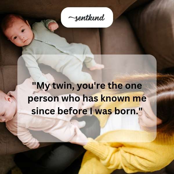 Identical twins stand side-by-side, their reflections mirroring each other.