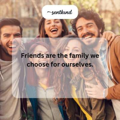 A diverse group of friends laughing and hugging outdoors, representing chosen family.