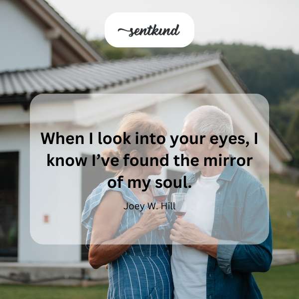 A couple gazing deeply into each other's eyes, reflecting love and connection.