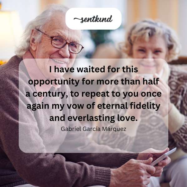 An elderly couple embraces tenderly, bathed in soft, golden light.