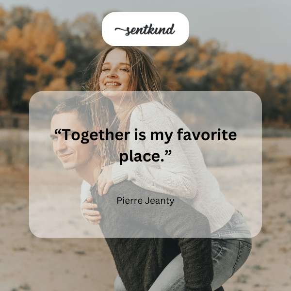 Close-up of intertwined hands symbolizing togetherness and affection.