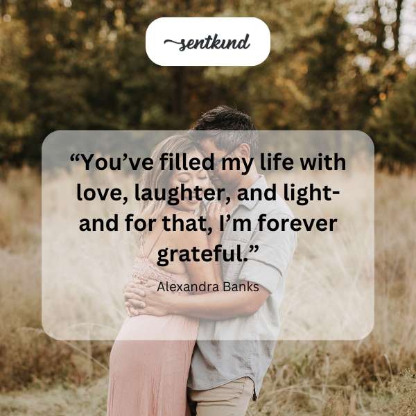 A radiant light bulb surrounded by hearts and smiling faces.