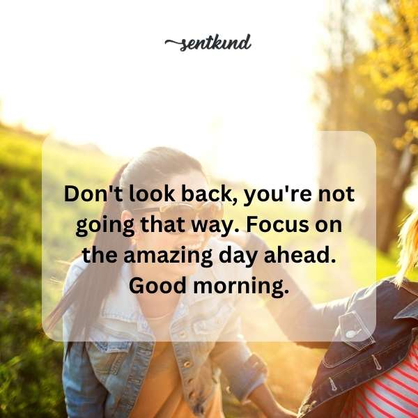 A winding road stretches forward into a bright, sunny horizon, suggesting a journey towards a positive future.