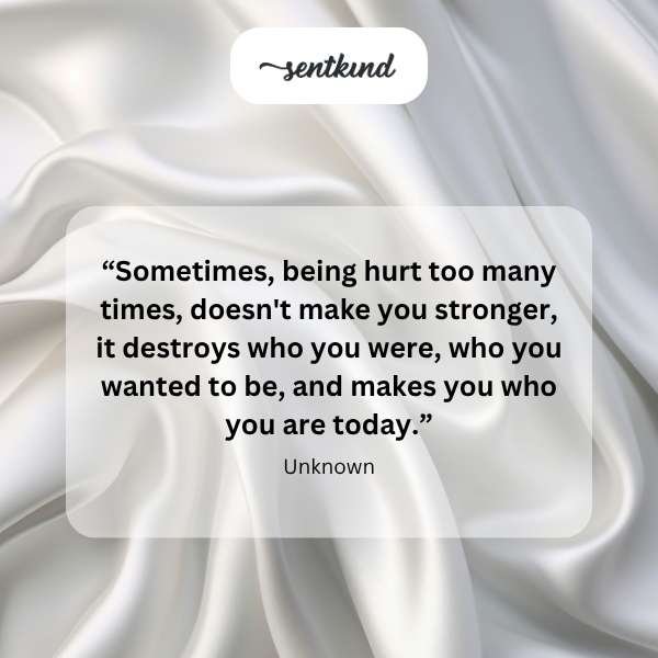 A person looks away with tears in their eyes, a shattered reflection visible in the background, symbolizing broken expectations.