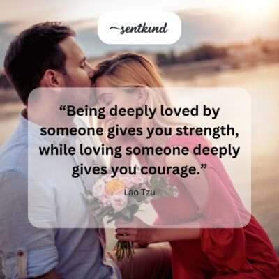 Two hands gently clasped together, symbolizing the connection between love, strength, and courage.