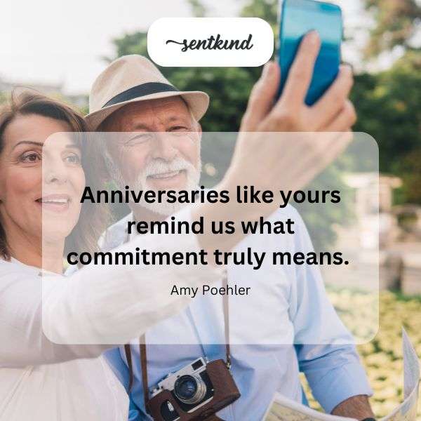 A couple joyfully celebrates their anniversary with cake and gifts.