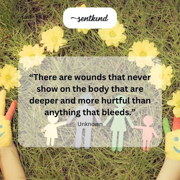 An illustration depicts a silhouette of a person sitting alone with their head in their hands, surrounded by fractured, dark abstract patterns representing psychological pain.